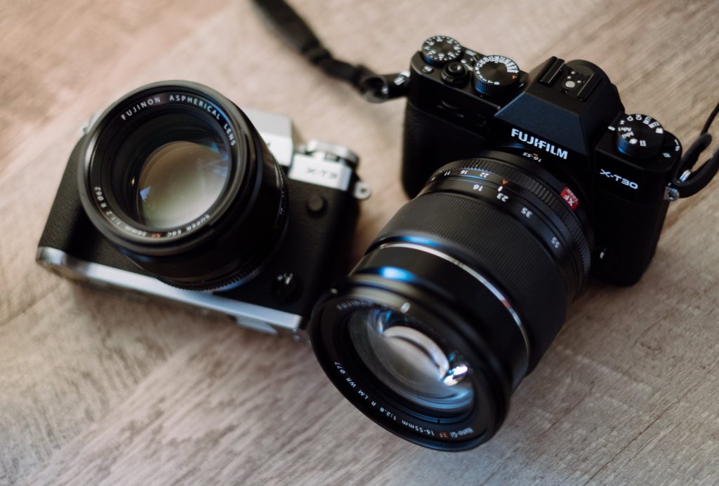 <alt text:Cameras with glass lenses.>