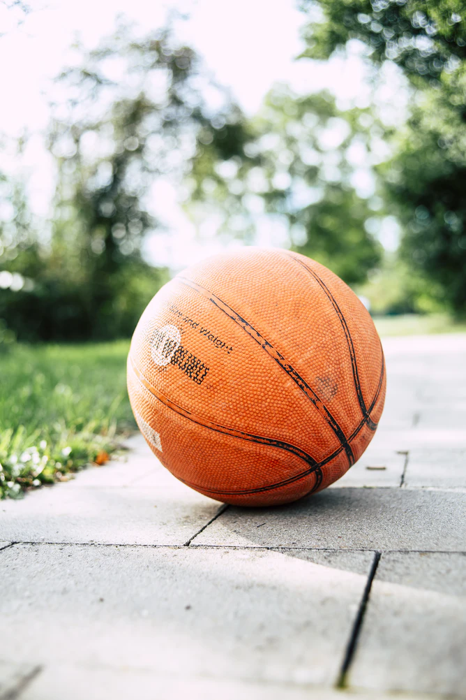 (alt-text: Basketball is kept out during season and put away in a sports storage unit in off season.)