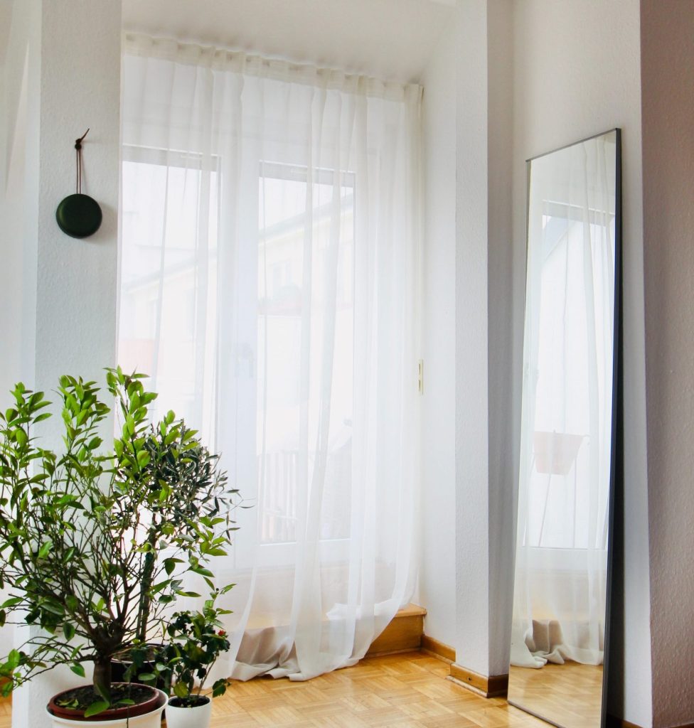 Adding curtains easily dresses your windows up so your house feels more like a show home.) 